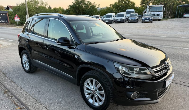 
								Volkswagen Tiguan 2.0 TDI 140 KS DSG 4MOTION Sport&Style FACELIFT full									